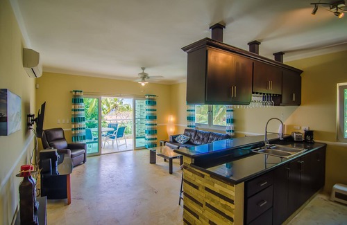 El Batey Apartment | Sea-views central condo with pool, BBQ. Guest-friendly, near sandy beach!