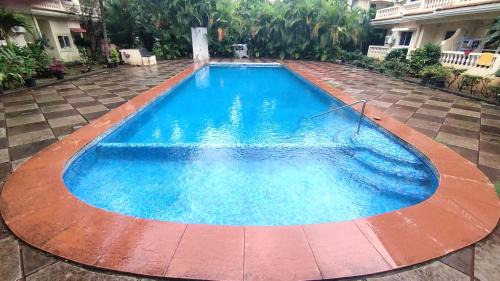 Orlim Apartment | Seacoast Retreat- Lovely 2 BHK apartment with pool