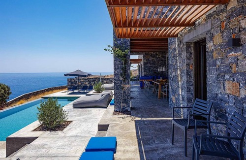 Vizari Villa | Seafront Brand New Villa by the peaceful Agios Pavlos beach