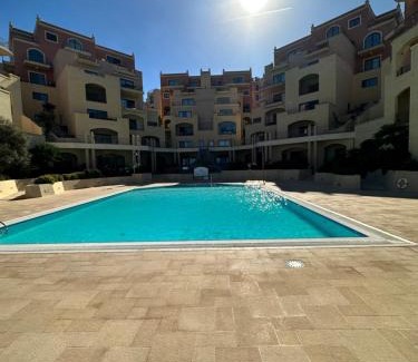 Santa Maria Estate Apartment | Seafront Mellieha Bay with Pool 3 Bed 250sqm