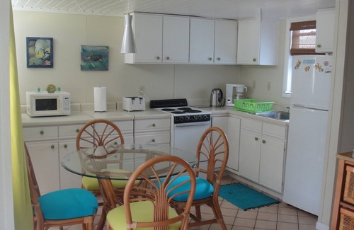 Kittian Village Condo | Sealofts37 Nestled in a Quiet Tropical Garden. Pool View, on the beach.