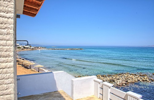 Kokkini Chani Villa | Seashell, an Elegant Seafront Villa by Nirousuites