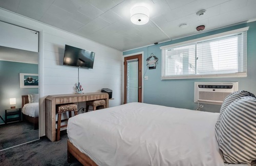 Ocean Bay Park Hotel | Seashore Condo Hotel #16, Cozy Fire Island Escape, Near Ferry - With Bay Views and Steps from the Beach.
