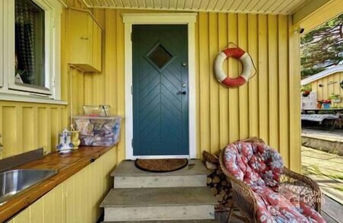 Gressvik House | Seaside cabin in Fredrikstad with private jetty, BBQ & sea view