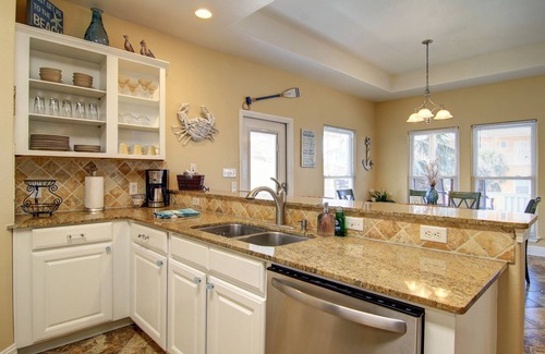 Sand Point House | Seaside Paradise – 4BR/3BA – Steps from the beach boardwalk and pool.