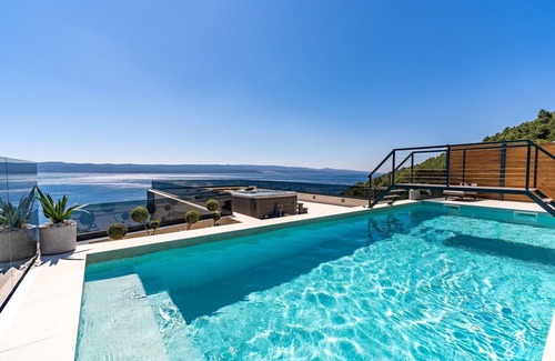Pisak Villa | Seaview Villa Blue Lagoon with private heated pool, 2 jacuzzies, sauna, media room, 6 bedrooms, beach 70m