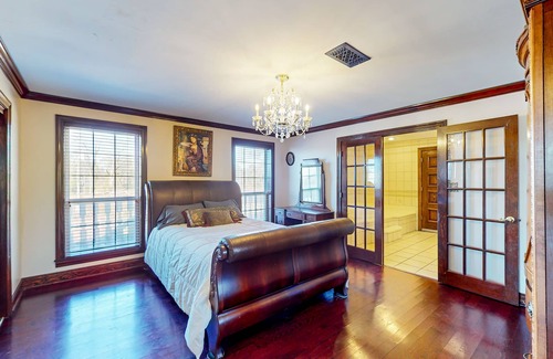 Magnolia Cabin | Secluded acreage with six bedrooms, pool, wood fireplace, ponds, grill, & AC