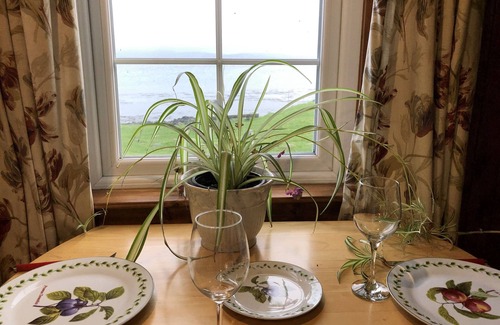 Campbeltown Cottage | Secluded beachside cottage in stunning location beside Campbeltown Loch