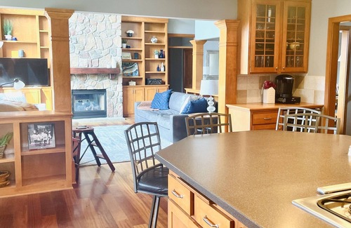 Stillwater House | Secluded Lakefront Home with outdoor hot tub, fire pit & indoor Hockey Rink
