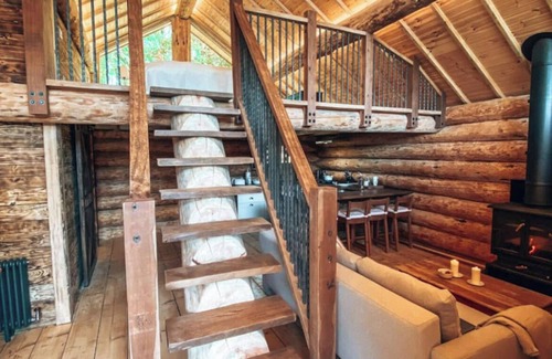 Bridport Cabin | Secluded Log Cabin/Hot Tub On Private Laken1km to Jurassic Coast Pet friendly.