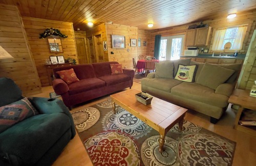 Manistee Cabin | Secluded log cabin in Manistee Nat'l Forest with access to Lake Michigan beach.