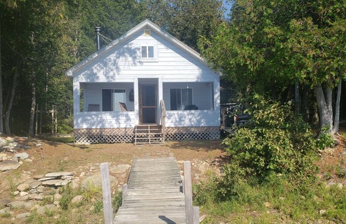 Sherman Station Cabin | Secluded OFF GRID lakeside camp