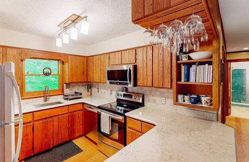 Whittier House | Secluded sunlit cabin with large patio, deck, fireplace & perfect mountain views