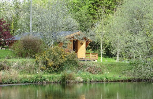 Truro Cottage | Secluded Swedish Lodge in Private Lakeside Gardens