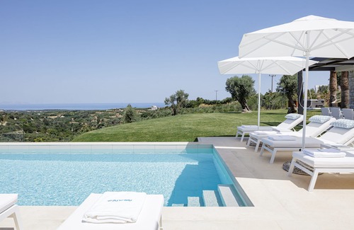 Kapsaliana Villa | Secluded villa with hot tub, heated pool & sea view!