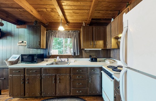 Parsonsfield House | Secluded waterfront cabin with private dock, kayak, canoe, gas grill & deck