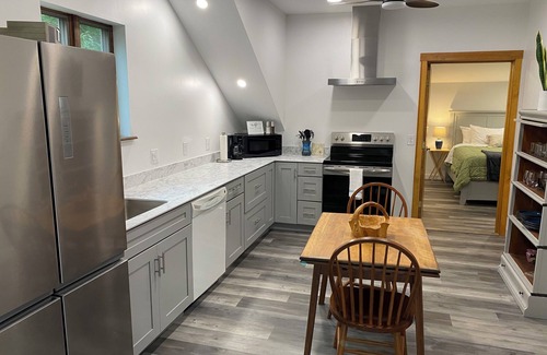 Harpswell Apartment | Second floor space with modern conveniences & artistic charm.