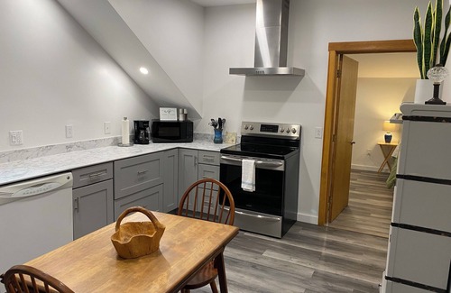 Harpswell Apartment | Second floor space with modern conveniences & artistic charm.