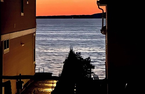 Beulah Apartment | Second floor unit close to downtown Beulah & Crystal Lake for year-round fun!
