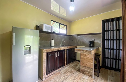 Rio Cuarto de Grecia Cabin | Selva Negra Loft: surrounded by mountains, rivers, lakes, and lush wildlife.