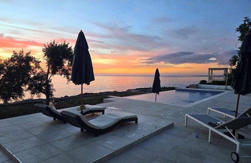 Whitehouse Villa | Serene 4BR Oceanfront Villa with Large Saltwater Pool and Direct Sea Access
