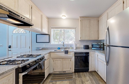 Groveland Cabin | Serene home with spacious deck, fireplace, loft, nearby amenities, dog friendly