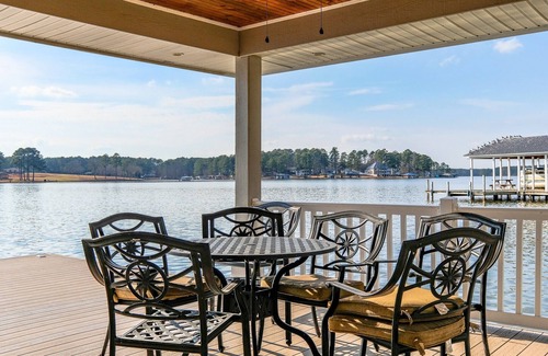 Henrico House | Serene Lakefront Escape with Sunset Views, Private Boathouse, and Endless Fun!