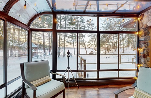 Lake Tomahawk House | Serene Lakefront Home with Fire pit, Dock, WIFI, & Dog-Friendly