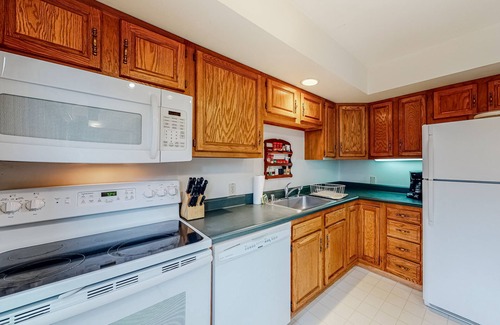 Waitsfield House | Serene riverfront townhouse with pool, tennis, basketball, washer/dryer, & WiFi
