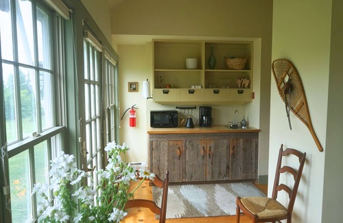Addison Cottage | Serene, sun splashed cottage