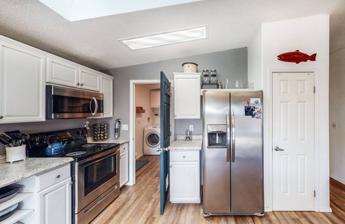 Port Orford House | Serene waterfront haven with lake views, fenced yard & home office