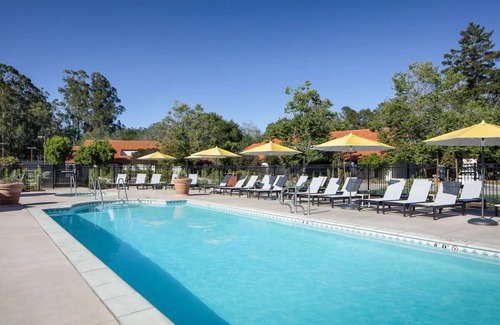 Live Oak Hotel | Serenity Now: Your Santa Cruz Retreat with Deck, Pool & Fireside Relaxation
