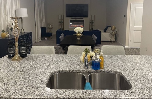 Covington House | Serine family-sized home with outdoor fire pit.