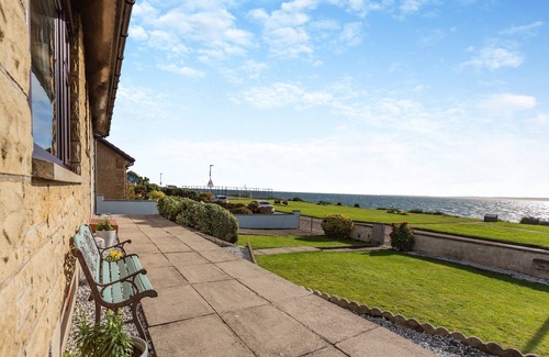 Fearn Cottage | Set in the village of Balintore, this spacious house offers an enclosed garden.