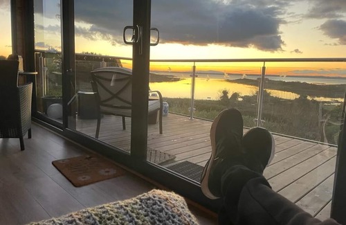 Portaferry Ski Chalet | Set on an elevated private site with commanding views over Strangford Lough.