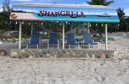 Bennett's Harbour House | Shangri-La- beach front views of crystal-clear blue waters and surreal sunsets.