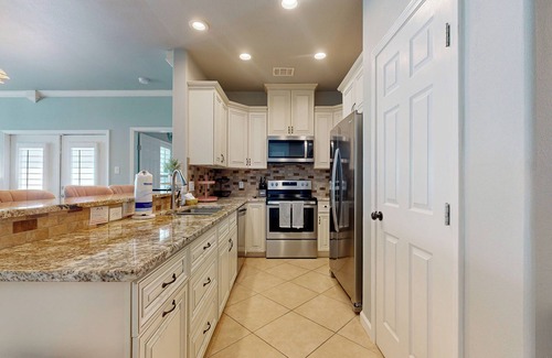 Safe Harbor Condo | Shared Pool, Pet Friendly, Golf Cart Access