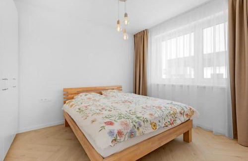 Nove Mesto Apartment | Shiny Stay with Balcony & Private Parking