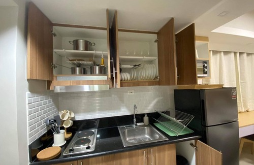 Barangay 76 Condo | Shore 3 Residences Authentic Japanese-Style Bedroom with Pool View - MOA Complex