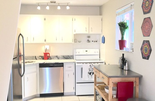 South Palm Park Neighborhood Association Apartment | Short Walk to Beach/Town-Artistic Apt., Gorgeous Garden W/Beautiful Shared Pool