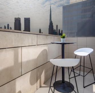 Bur Dubai Apartment | Silkhaus modish studio with Burj Khalifa view, pool access