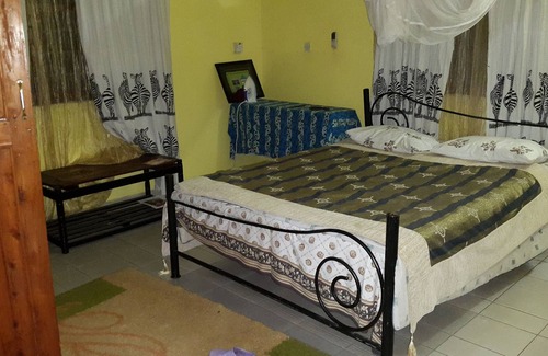 Mbezi Beach Apartment | Simple, Clean Warm, Friendly Home, With A Spacious Room En Suite With Ac