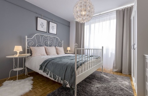 Cluj-Napoca Apartment | Simple white top floor apartment close to old town