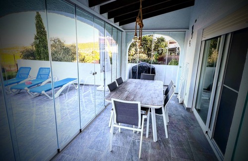 Orba House | Simply relax with a fantastic view of the valley, mountains and sea.