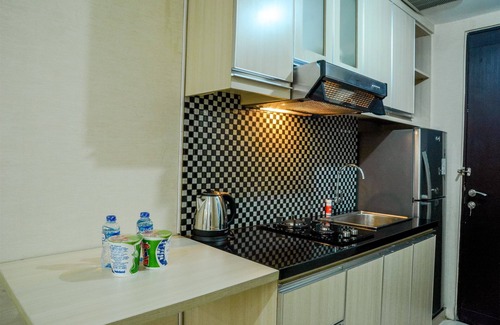 Panunggangan Utara Apartment | Simply Studio Room at Grand Serpong Apartment By Travelio