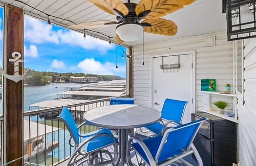 Lakeland Condo | Single-level lake-view condo with dock, outdoor pool, washer/dryer, & central AC