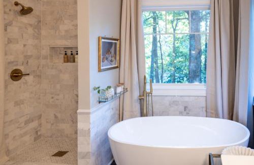 Jonesboro House | Sink into the Luxe Corner Tub at an Upscale, Spacious Home