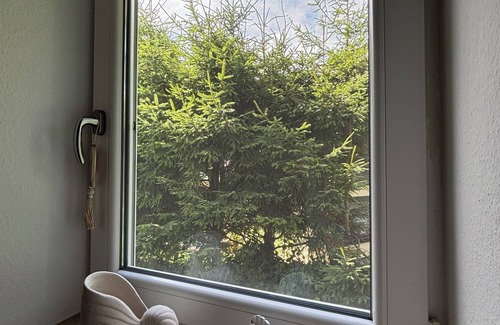 Igstadt Apartment | Sit back and relax - in this quiet, stylish accommodation