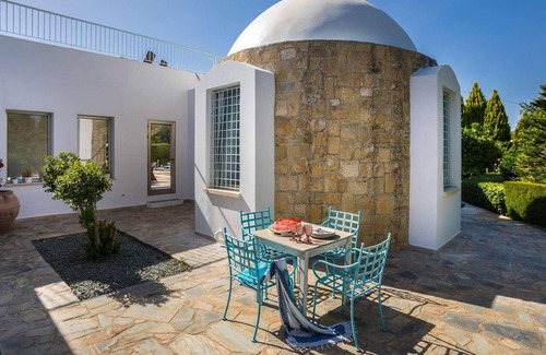 Giolou House | Situated in the inland region of Miliou, this stylish villa (which is next door to its sister villa