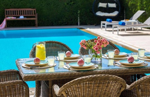 Giolou House | Situated in the inland region of Miliou, this stylish villa (which is next door to its sister villa